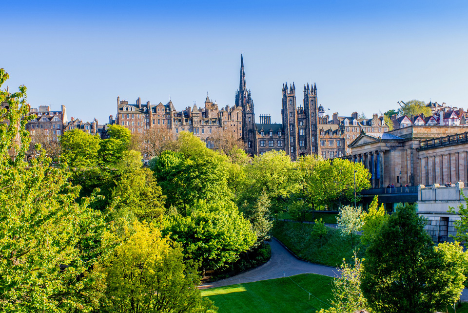 A view of the skyline of Edinburgh on a sunny day, from Princes Street.