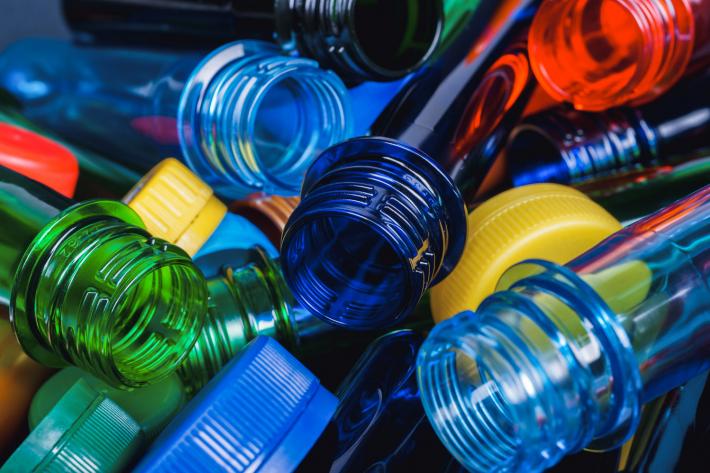A close up different coloured plastic bottles