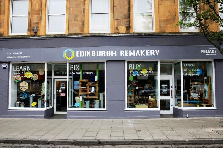 The grey painted exterior of the Remakery shop.
