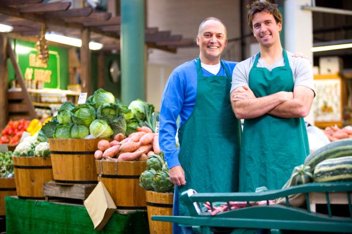 Local grocers smiling